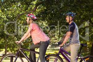 Happy couple on a bike ride