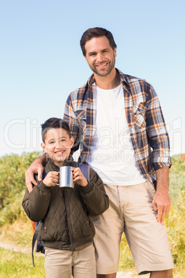 Father and son hiking in the mountains