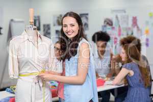 Confident female fashion designer