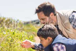 Father and son hiking in the mountains