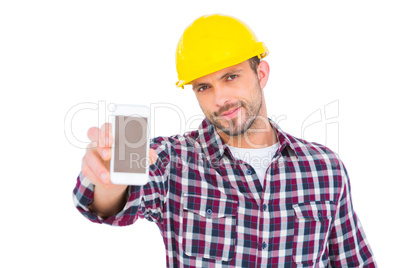 Handyman showing smart phone