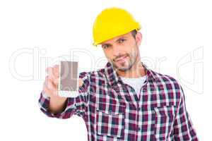 Handyman showing smart phone