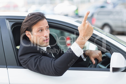 Businessman experiencing road rage