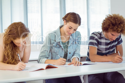 Fashion students taking notes in class