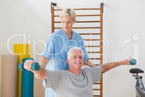 Senior man training with his therapist
