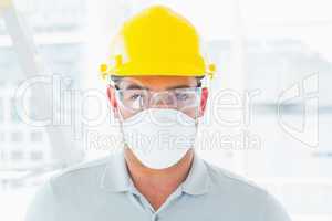 Confident handyman wearing protective workwear