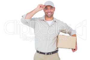 Portrait of happy delivery man with cardboard box wearing cap