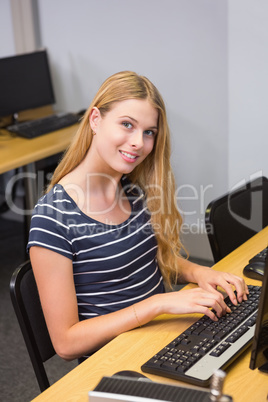 Student working on computer in classroom