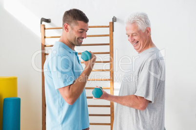 Senior man training with his coach