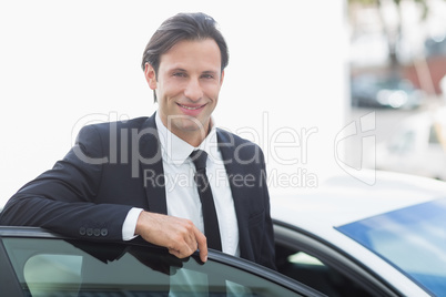 Businessman smiling at camera