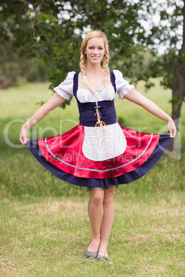 Pretty oktoberfest girl smiling at camera