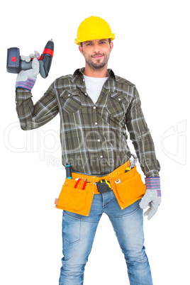 Handyman wearing tool belt while holding power drill