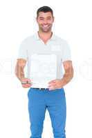 Delivery man giving clipboard for signature on white background