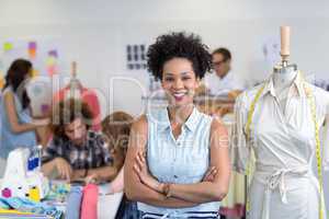 Portrait of confident female fashion designer