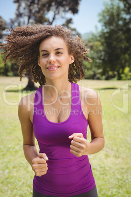 Fit woman jogging in the park