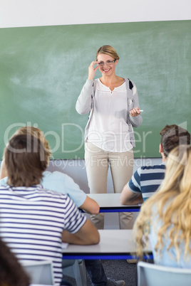 Teacher teaching students in class