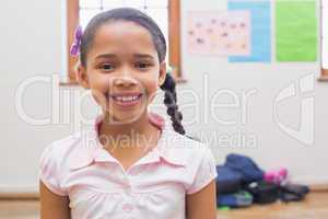 Smiling pupil in classroom
