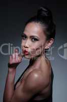 Close up Young Fit Woman in Hushing Gesture