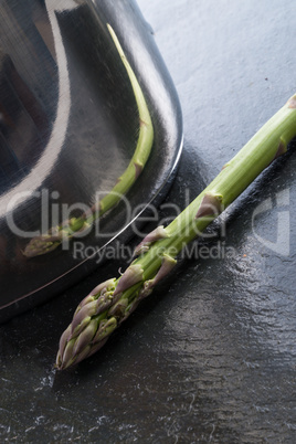 Green asparagus in the pot