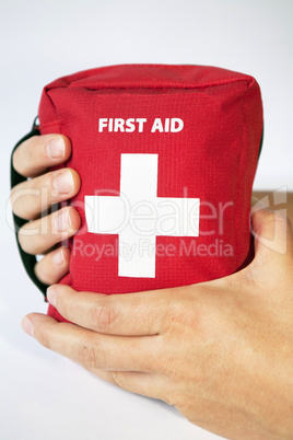 First aid kit with two hands - english tittle