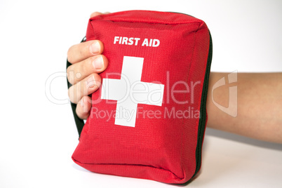 First aid kit with hand - english tittle