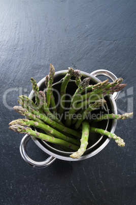 Green asparagus in the pot