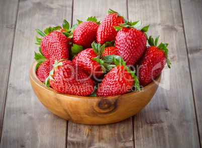 strawberries in a wooden bowl