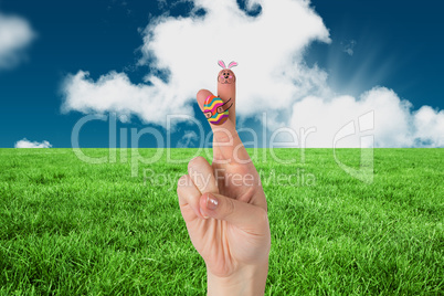 Composite image of fingers as easter bunny