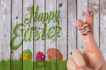 Composite image of fingers as easter bunny