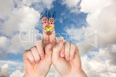 Composite image of fingers as easter bunny