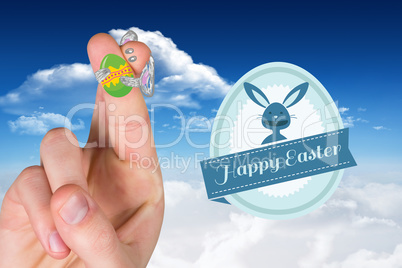 Composite image of fingers as easter bunny