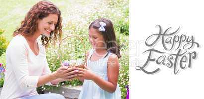 Composite image of happy mother and daughter collecting easter e
