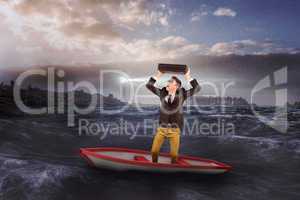 Composite image of businessman in boat