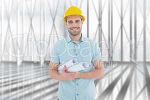 Composite image of happy male architect holding blueprints
