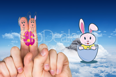 Composite image of fingers as easter bunny