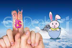 Composite image of fingers as easter bunny