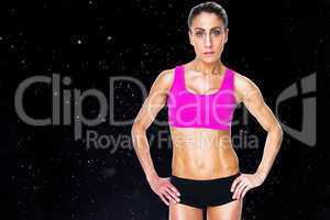 Composite image of female bodybuilder posing with hands on hips