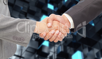 Composite image of handshake between two business people