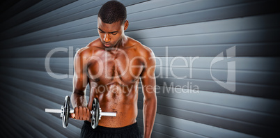 Composite image of serious fit shirtless young man lifting dumbb