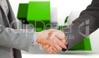 Composite image of two people having a handshake in an office