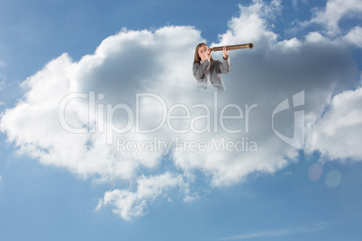 Composite image of businesswoman looking through a telescope