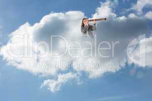 Composite image of businesswoman looking through a telescope