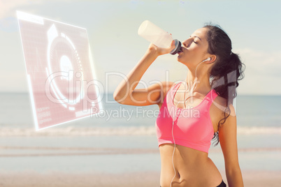 Composite image of beautiful healthy woman drinking water on bea