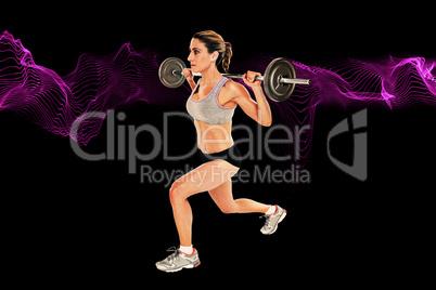 Composite image of serious female crossfitter lifting barbell be