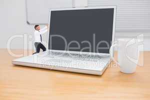 Composite image of businessman pushing