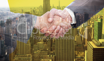 Composite image of handshake between two business people