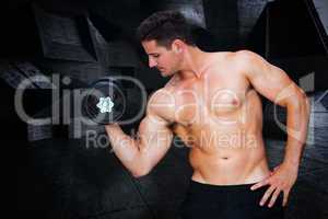 Composite image of bodybuilder lifting dumbbell