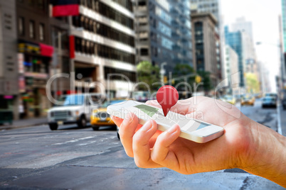 Composite image of man using map app on phone