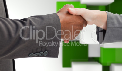 Composite image of business handshake