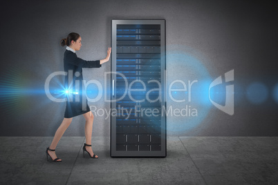 Composite image of businesswoman pushing